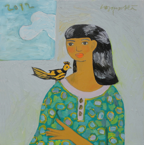 Young girl with bird